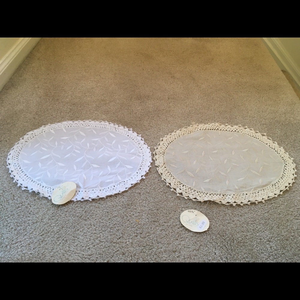 Pair of Irish made lace doilies. NEW with tags. One white one beige. 10x14.